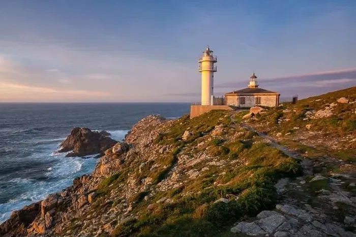 Framed Print : Sea landscape view of Cape Tourinan Lighthouse at sunset with pink clouds, in Spain Framed Print : Sea landscape view of Cape Tourinan Lighthouse at sunset with pink clouds, in Spain