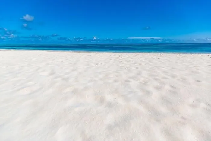 Framed Print : Sea sand sky concept. Closeup of sand on beach and blue summer sky, calmness and inspiration nature concept Framed Print : Sea sand sky concept. Closeup of sand on beach and blue summer sky, calmness and inspiration nature concept