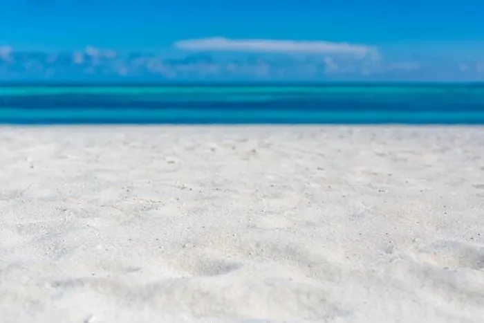 Framed Print : Sea sand sky concept. Closeup of sand on beach and blue summer sky, calmness and inspiration nature concept Framed Print : Sea sand sky concept. Closeup of sand on beach and blue summer sky, calmness and inspiration nature concept