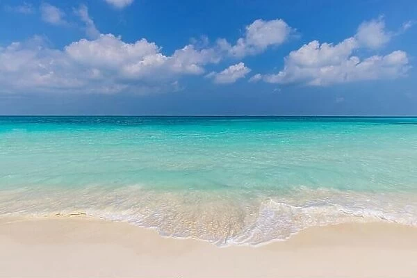Sea sand sky, nature landscape concept. Tropical island shore, coast as beach scenery. Perfect waves on calm seaside horizon. Exotic Indian ocean bay