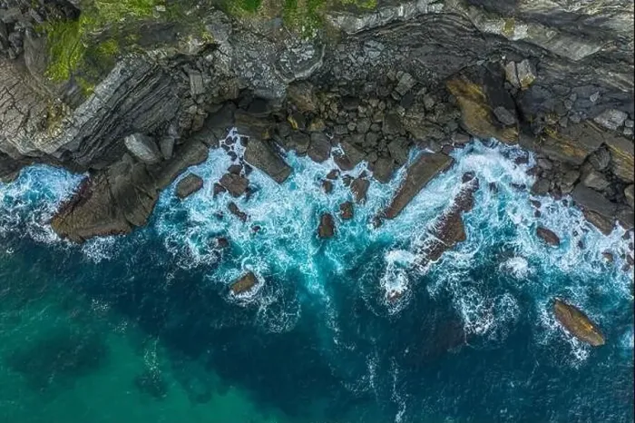 Framed Print : Detail of sea waves colors breaking in the coast of Lekeitio, Basque country - drone aerial view Framed Print : Detail of sea waves colors breaking in the coast of Lekeitio, Basque country - drone aerial view