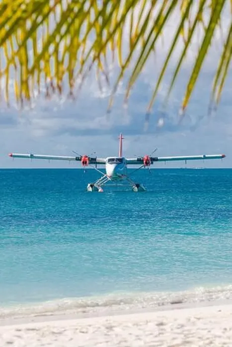 Framed Print : Seaplane at tropical beach resort. Luxury summer travel destination seaplane in Maldives islands. Exotic vacation holiday transportation, Maldives Framed Print : Seaplane at tropical beach resort. Luxury summer travel destination seaplane in Maldives islands. Exotic vacation holiday transportation, Maldives