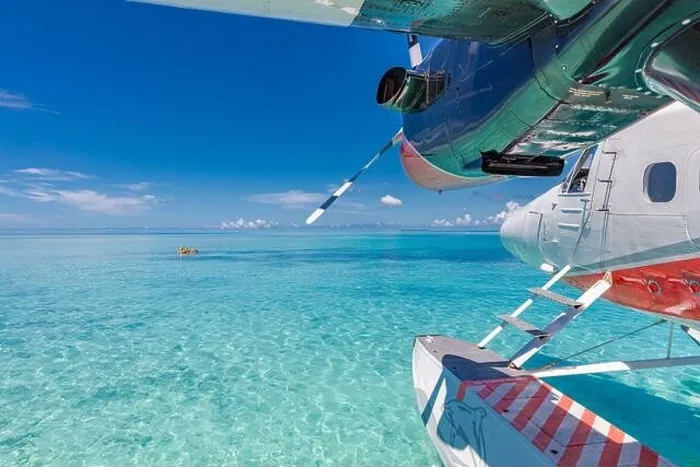Framed Print : Seaplane at tropical beach resort. Amazing summer travel vacation view. Perfect blue sea view with Maldives islands, transportation, plane, seascape Framed Print : Seaplane at tropical beach resort. Amazing summer travel vacation view. Perfect blue sea view with Maldives islands, transportation, plane, seascape