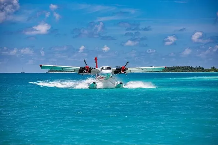 Framed Print : Seaplane at tropical beach resort. Luxury summer travel destination with seaplane in Maldives islands. Exotic vacation holiday transportation Maldives Framed Print : Seaplane at tropical beach resort. Luxury summer travel destination with seaplane in Maldives islands. Exotic vacation holiday transportation Maldives