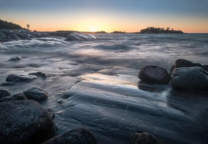 Framed Print : Seascape with windy weather and sunset at evening light in coastline, Finland Framed Print : Seascape with windy weather and sunset at evening light in coastline, Finland