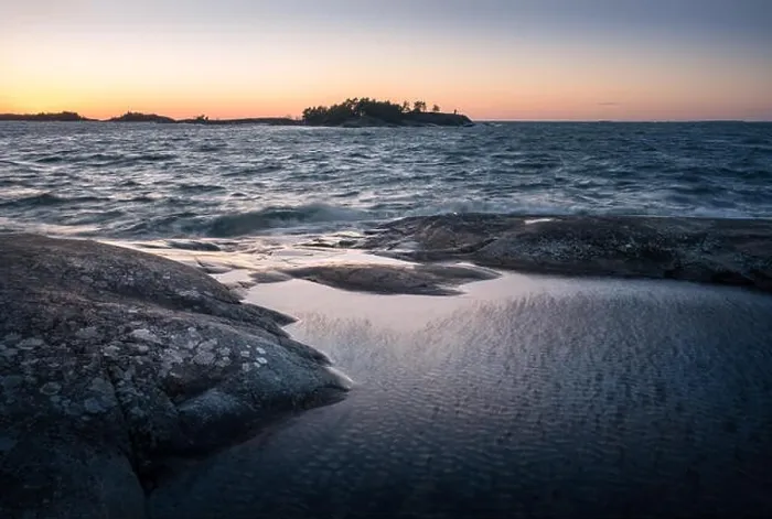 Framed Print : Seascape with windy weather and sunset at evening light in coastline, Finland Framed Print : Seascape with windy weather and sunset at evening light in coastline, Finland