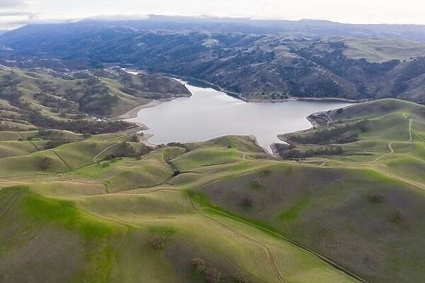 Seen from a bird's eye view, the hills of northern California, just east from Oakland and San Francisco, have turned green after winter rains