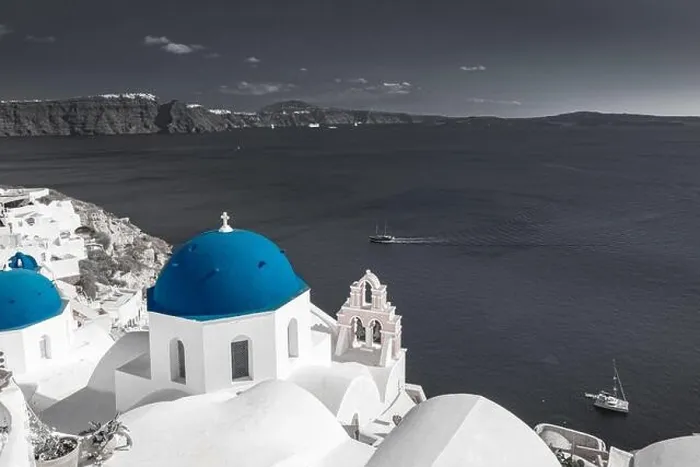 Framed Print : Selective color image, blue color with black and white process. Oia view in Santorini, caldera and blue church dome. Idyllic, inspirational travel Framed Print : Selective color image, blue color with black and white process. Oia view in Santorini, caldera and blue church dome. Idyllic, inspirational travel