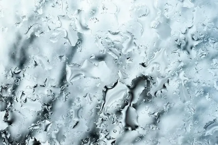 Framed Print : (selective focus) Close-up view of some drops of water on a glass during a rainy day Framed Print : (selective focus) Close-up view of some drops of water on a glass during a rainy day