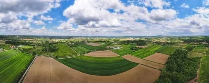 Framed Print : Serbian village and their farm fields in springtime. Aerial drone view of fields in the countryside Framed Print : Serbian village and their farm fields in springtime. Aerial drone view of fields in the countryside