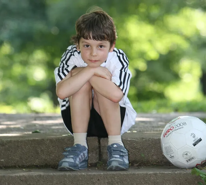Framed Print : Seven-year-old Felix Prengel poses with a football in Munich Framed Print : Seven-year-old Felix Prengel poses with a football in Munich
