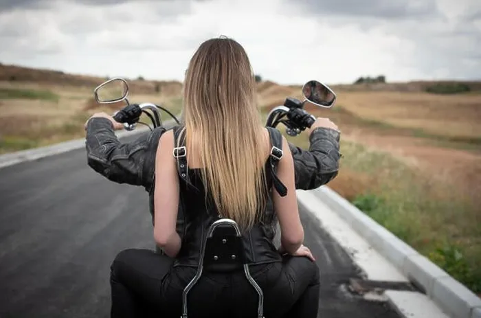 Framed Print : Sexy woman wearing with blonde long hair riding a street motorbike outdoors. Exploration journey adventure, street bike Framed Print : Sexy woman wearing with blonde long hair riding a street motorbike outdoors. Exploration journey adventure, street bike