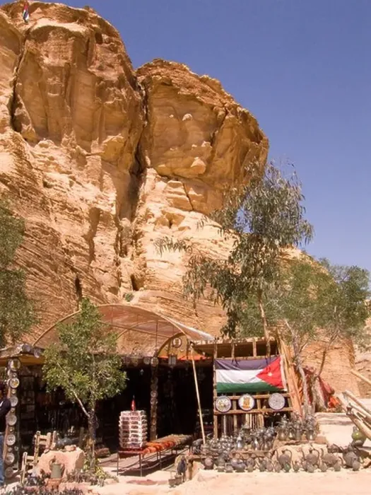 Framed Print : shaded store outside petra jordan in lee of rock escarpment Framed Print : shaded store outside petra jordan in lee of rock escarpment