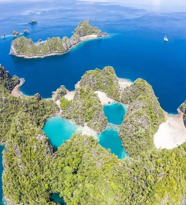 Framed Print : Shallow coral reefs surround remote limestone islands in Raja Ampat, Indonesia. This biodiverse region is known as the heart of the Coral Triangle Framed Print : Shallow coral reefs surround remote limestone islands in Raja Ampat, Indonesia. This biodiverse region is known as the heart of the Coral Triangle