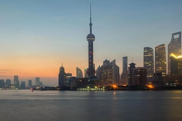 Shanghai, China city skyline on the Huangpu River in Shanghai, China