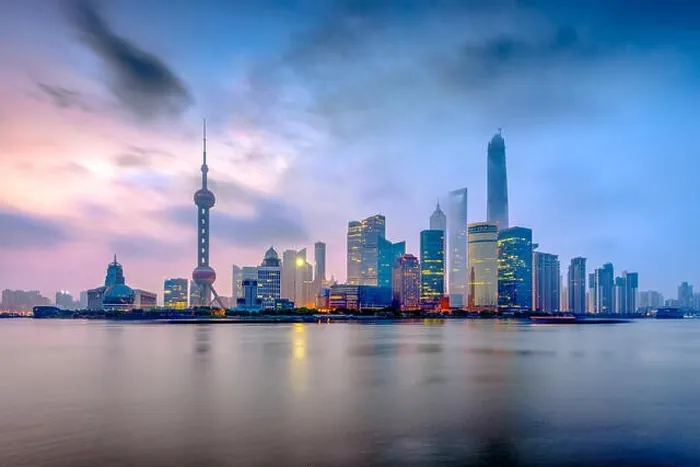 Framed Print : Shanghai, China Pudong Financial District over the Huangpu river from the Bund at dawn Framed Print : Shanghai, China Pudong Financial District over the Huangpu river from the Bund at dawn