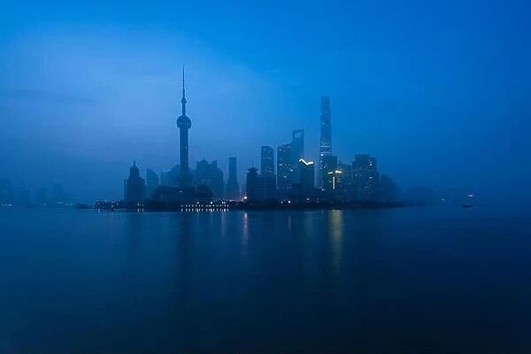 Shanghai city at morning in foggy day in Shanghai, China