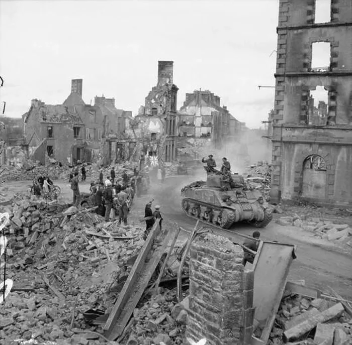 Framed Print : Sherman tank of the British Army driving through the ruins of Flers, Normandy, during operations on 17 August 1944 Framed Print : Sherman tank of the British Army driving through the ruins of Flers, Normandy, during operations on 17 August 1944