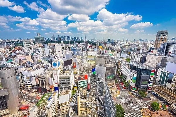 Shibuya, Tokyo, Japan city skyline over Shibuya Scramble Crosswalk in the afternoon