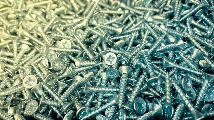 Framed Print : Shiny short self-tapping screws close-up Framed Print : Shiny short self-tapping screws close-up