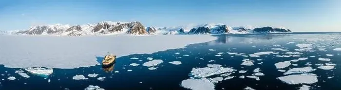 Framed Print : Ship cruising through the ice in Svalbard