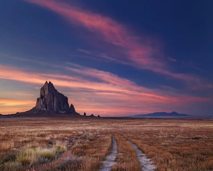 Framed Print : Shiprock, the great volcanic rock mountain in desert plane of New Mexico, USA