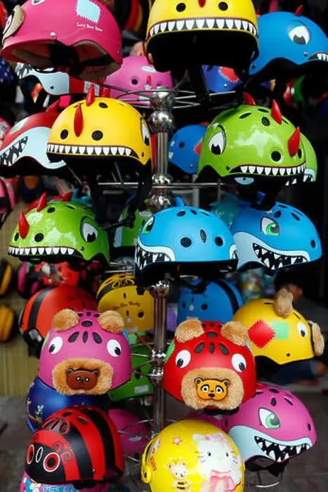 Framed Print : Shop for Kids Bike Helmets. Ho Chi Minh City. Vietnam Framed Print : Shop for Kids Bike Helmets. Ho Chi Minh City. Vietnam