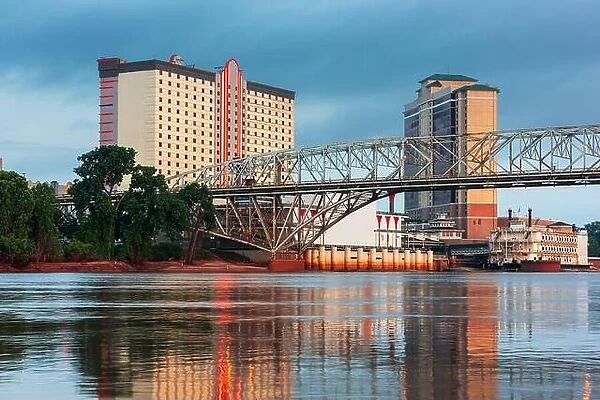 Shreveport, Louisiana, USA downtown skyline on the Red River at twilight