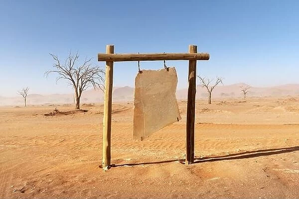 Empty sign board from stone in Namib desert