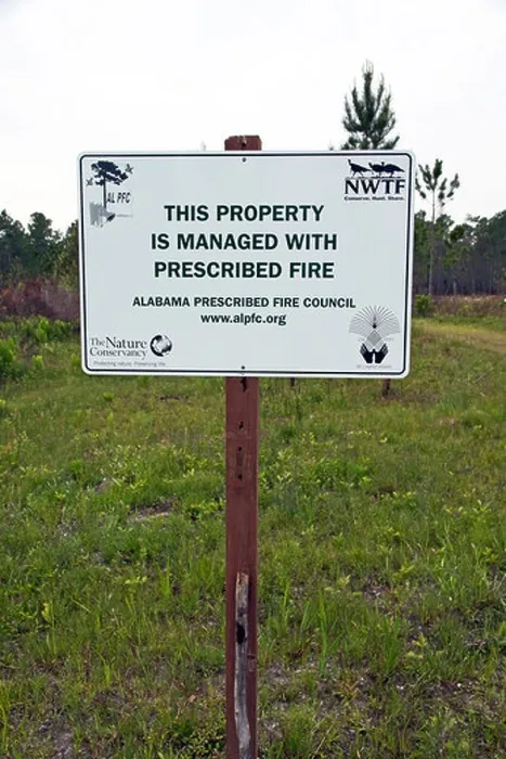 Framed Print : Sign indicating the surrounding natural area is subject to prescribed burns as a tool of wildlife habitat management Framed Print : Sign indicating the surrounding natural area is subject to prescribed burns as a tool of wildlife habitat management