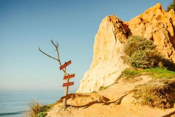 Framed Print : Sign of possibilities at Falesia beach with orange cliffs in Algarve, Portugal Framed Print : Sign of possibilities at Falesia beach with orange cliffs in Algarve, Portugal