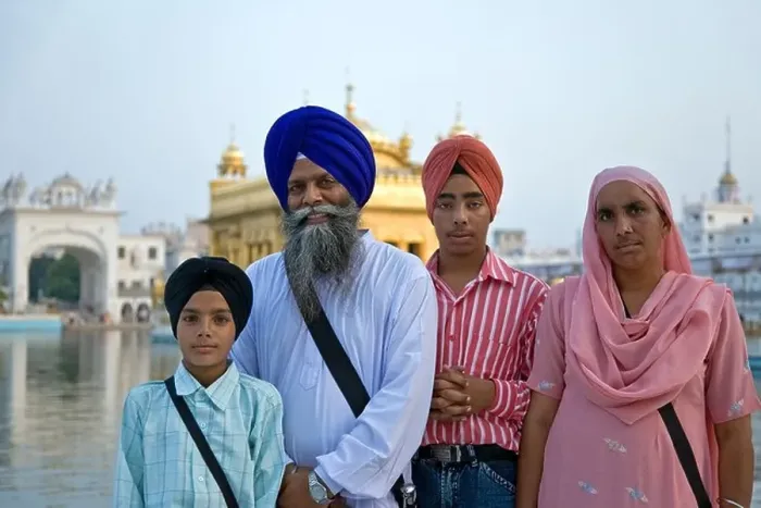 Framed Print : Sikh family at the Golden Temple. Amritsar. Punjab. India Framed Print : Sikh family at the Golden Temple. Amritsar. Punjab. India
