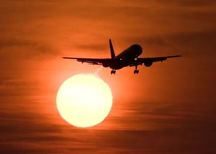 Framed Print : Silhouette of a Boeing 757 civil airliner landing at London Heathrow airport against a large golden sun at sunset Framed Print : Silhouette of a Boeing 757 civil airliner landing at London Heathrow airport against a large golden sun at sunset