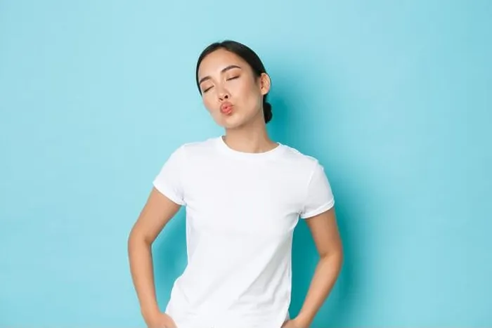 Framed Print : Silly and cute asian girl close eyes and dreamy pouting Framed Print : Silly and cute asian girl close eyes and dreamy pouting