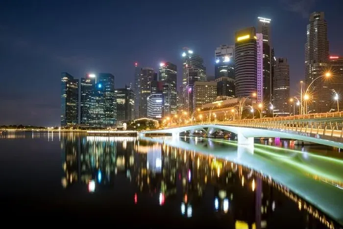 Framed Print : Singapore business district skyline financial downtown building with tourist sightseeing in night at Marina Bay, Singapore. Asian tourism, modern city Framed Print : Singapore business district skyline financial downtown building with tourist sightseeing in night at Marina Bay, Singapore. Asian tourism, modern city