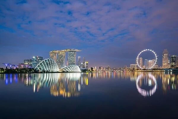 Singapore business district skyline at night in Marina Bay, Singapore