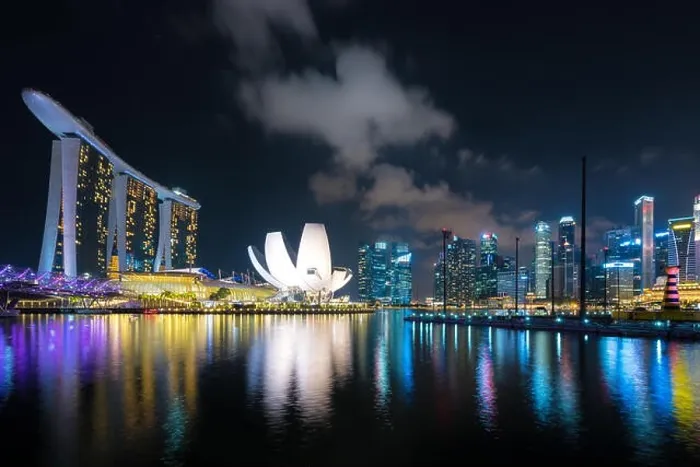 Framed Print : Singapore business district skyline in night at Marina Bay, Singapore Framed Print : Singapore business district skyline in night at Marina Bay, Singapore