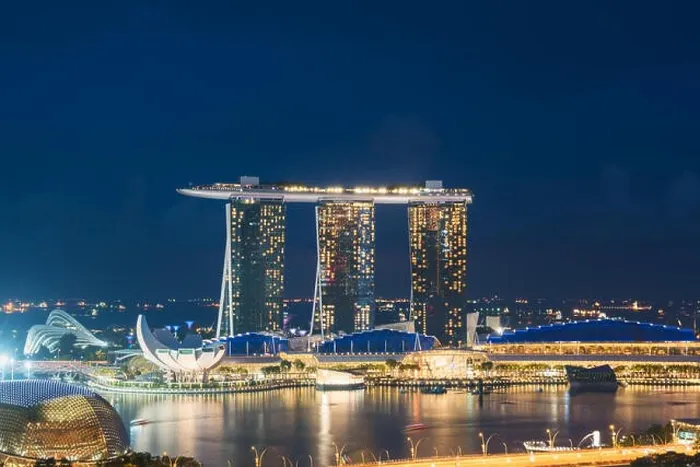 Framed Print : Singapore business district skyline in night at Marina Bay, Singapore Framed Print : Singapore business district skyline in night at Marina Bay, Singapore