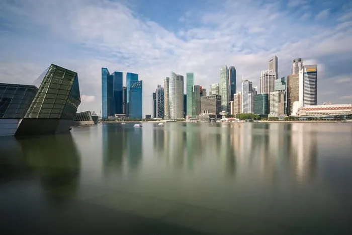 Framed Print : Singapore business district with skyscraper building and reflection at Marina Bay, Singapore Framed Print : Singapore business district with skyscraper building and reflection at Marina Bay, Singapore