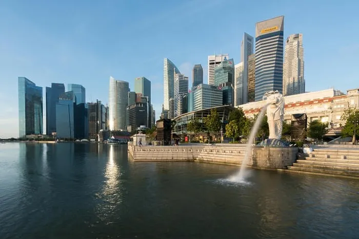 Framed Print : SINGAPORE - FEBRUARY 27, 2017 : Merlion statue fountain with Singapore business district skyline with sunrise in morning at Marina Bay, Singapore Framed Print : SINGAPORE - FEBRUARY 27, 2017 : Merlion statue fountain with Singapore business district skyline with sunrise in morning at Marina Bay, Singapore