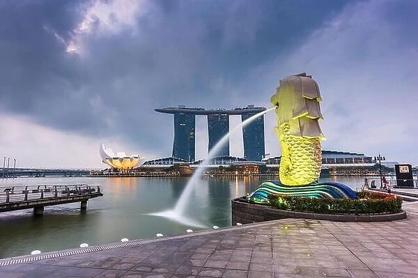 SINGAPORE - SEPTEMBER 6, 2015: The Merlion fountain at Marina Bay. The merlion is a marketing icon used as a mascot and national personification of Si