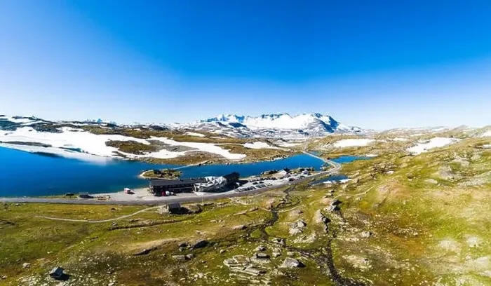 Framed Print : Ski training centre surrounded by lake and mountains, aerial view, Sognefjell, Jotunheimen, Norway, Europe Framed Print : Ski training centre surrounded by lake and mountains, aerial view, Sognefjell, Jotunheimen, Norway, Europe