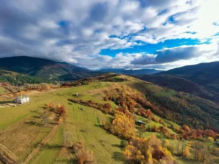 Framed Print : Sky with white and fluffy layer of clouds over green autumn hills, Aerial panoramic drone shot Framed Print : Sky with white and fluffy layer of clouds over green autumn hills, Aerial panoramic drone shot