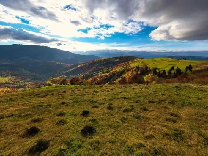 Framed Print : Sky with white and fluffy layer of clouds over green autumn hills, Aerial panoramic drone shot Framed Print : Sky with white and fluffy layer of clouds over green autumn hills, Aerial panoramic drone shot