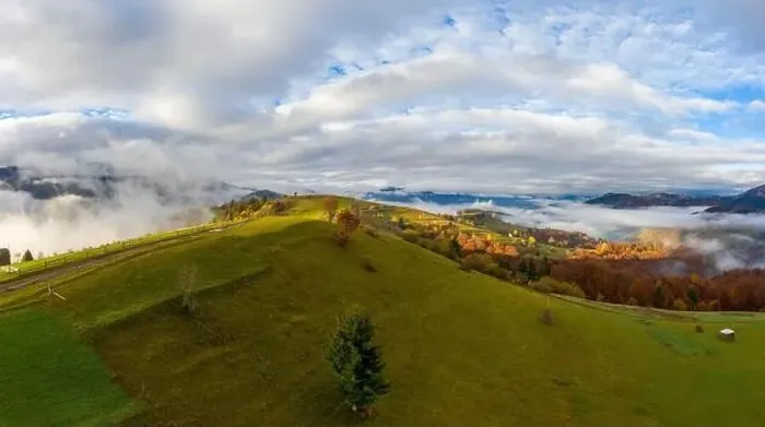 Framed Print : Sky with white and fluffy layer of clouds over green autumn hills, Aerial panoramic drone shot Framed Print : Sky with white and fluffy layer of clouds over green autumn hills, Aerial panoramic drone shot