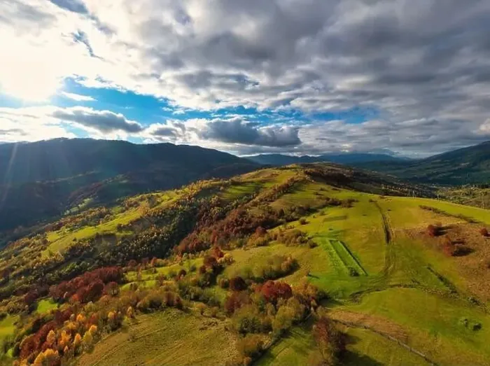 Framed Print : Sky with white and fluffy layer of clouds over green autumn hills, Aerial panoramic drone shot Framed Print : Sky with white and fluffy layer of clouds over green autumn hills, Aerial panoramic drone shot