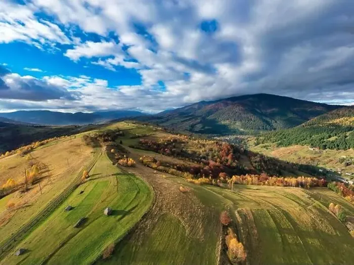 Framed Print : Sky with white and fluffy layer of clouds over green autumn hills, Aerial panoramic drone shot Framed Print : Sky with white and fluffy layer of clouds over green autumn hills, Aerial panoramic drone shot