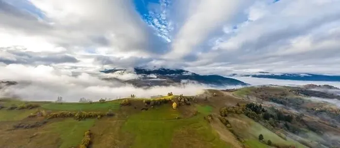 Framed Print : Sky with white and fluffy layer of clouds over green autumn hills, Aerial panoramic drone shot Framed Print : Sky with white and fluffy layer of clouds over green autumn hills, Aerial panoramic drone shot