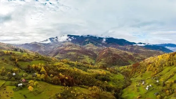 Framed Print : Sky with white and fluffy layer of clouds over green autumn hills, Aerial panoramic drone shot Framed Print : Sky with white and fluffy layer of clouds over green autumn hills, Aerial panoramic drone shot