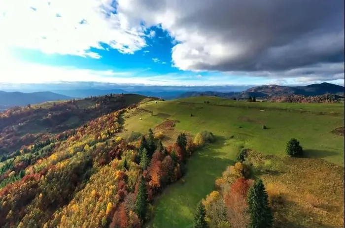 Framed Print : Sky with white and fluffy layer of clouds over green autumn hills, Aerial panoramic drone shot Framed Print : Sky with white and fluffy layer of clouds over green autumn hills, Aerial panoramic drone shot